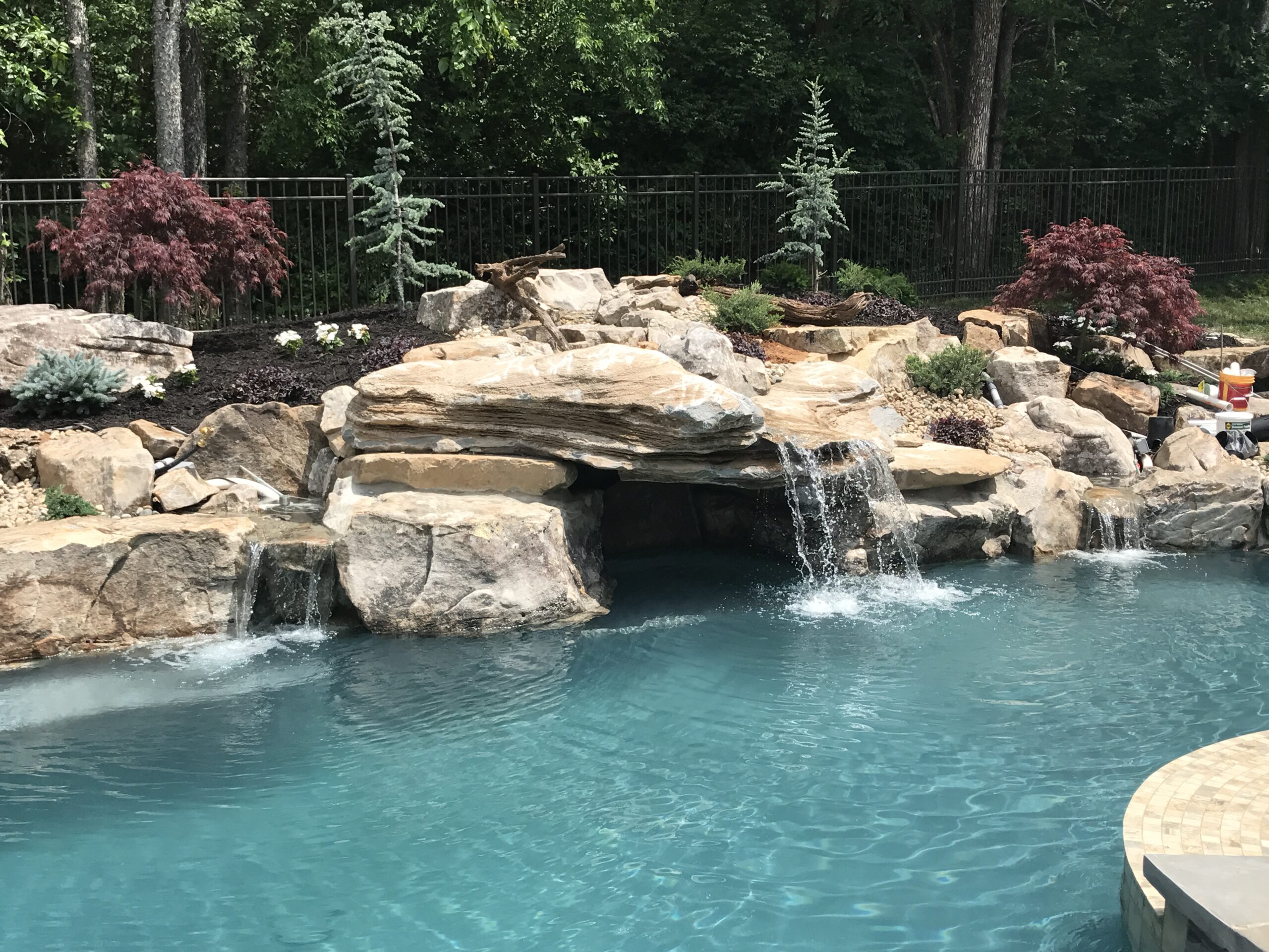 Pool Waterfalls: Pros, Cons, and Everything You Need To Know - Peek 